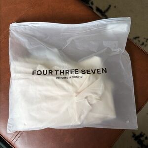 NEW 437 Ivory Wrap Top in S